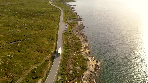 Logistics Truck transporting goods on a Scenic Route