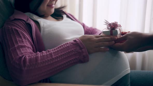 Pregnant Couple Feels Love and Relax at Home