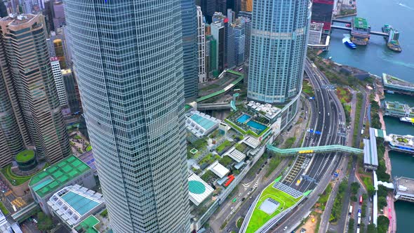 Aerial View Road Traffic and Hong Kong Central Financial District Skyscrapers in Hong Kong, China.