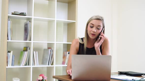 Blonde Business Woman Working at Modern Office