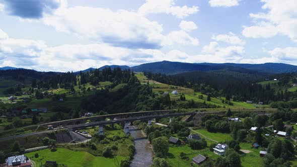 The Viaduct in Vorokhta is a Railway Stone Arch Bridge Across the Prut River Aerial View