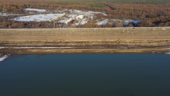 Flight Over A Dam On A Snowy Winter Day 