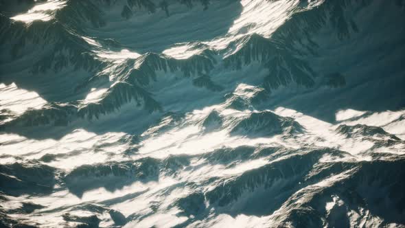 Aerial View of the Alps Mountains in Snow