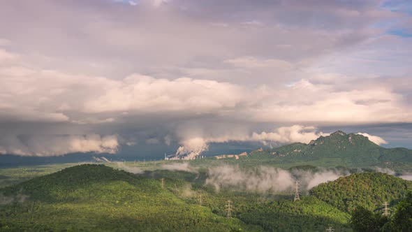 Rain storms and black clouds moving over the mountains.