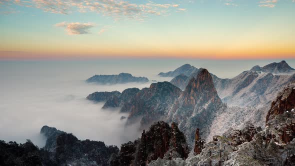 Sunrise time lapse of fog at the Yellow Mountains in China