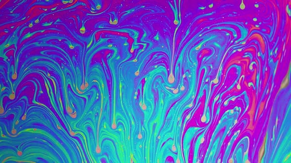 Macro soap bubble creates a colorful and psychedelic background