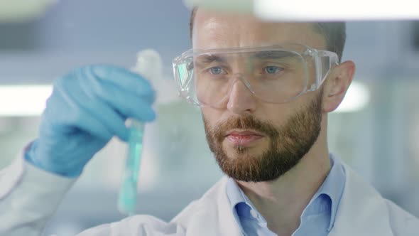 Chemist Making Scientific Experiment alt