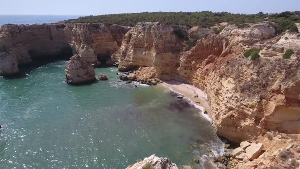 Flying over one of the most beautiful beaches - Praia Da Marinha in Portugal