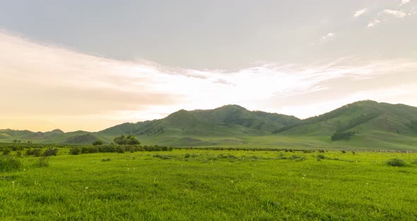 Mountain Meadow Timelapse at the Summer or Autumn Sunrise Time