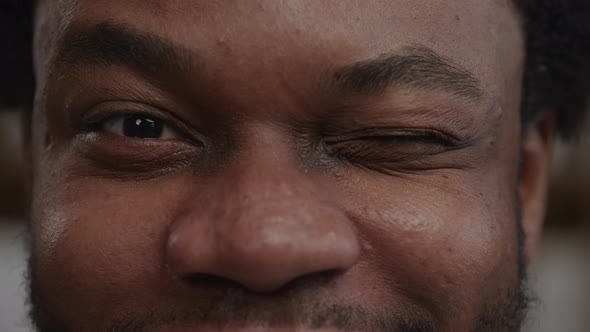 Close Up Shot of an African American Man Eyes in a Single Blink