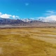 Aerial photo of blue sky and golden grassland on Pamir Plateau - VideoHive Item for Sale