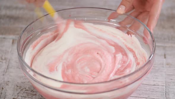 Baker Making Berry Mousse For Cake