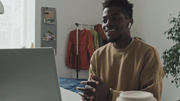 African American Man Having Online Video Call at Home