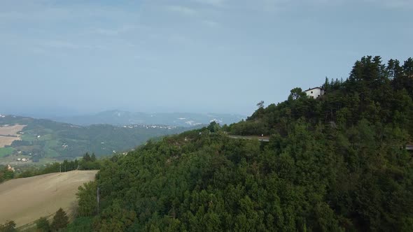 Drone Aerial Flight Over Green Forests in Tuscany, Italy