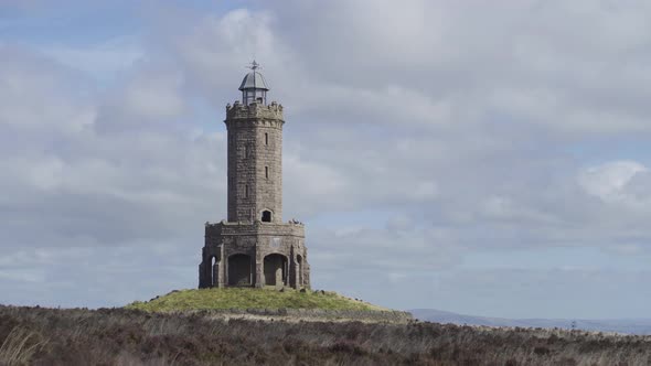 A view of Darwen Tower in Lancashire on a windy day