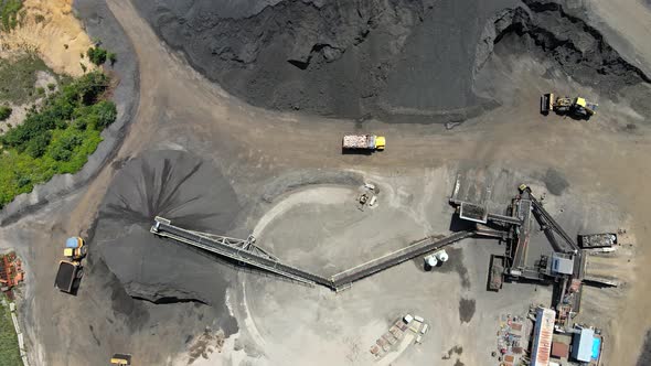 Aerial View of Heavy Machinery for Crushing and Collecting Stone Gravel Materials for Asphalt