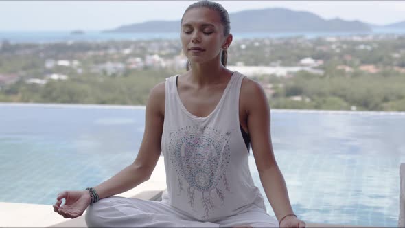 Adult Lady Practicing Yoga While Resting at Resort