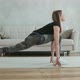 Young attractive woman with prosthetic leg does stretching exercise - VideoHive Item for Sale