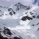 Flight above snowcapped mountains near Elbrus - VideoHive Item for Sale