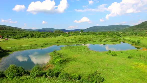 Aerial view of Jesenica river and surrounding in Croatian region Lika.