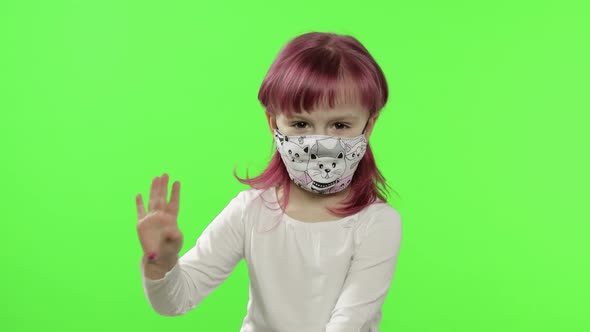 Little Girl in Medical Face Mask. Isolation. World Pandemic COVID-19 Coronavirus