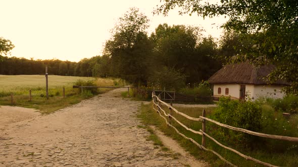 Walking Along Countryside Village Pathway