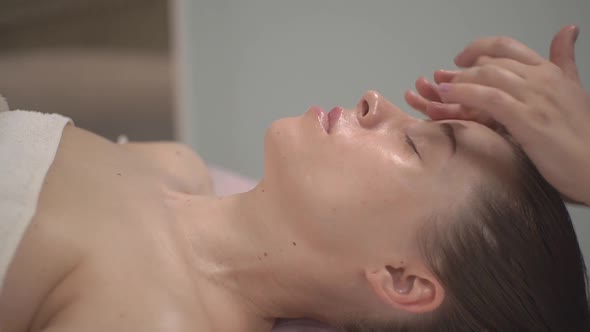 a Girl Gets a Facial Massage