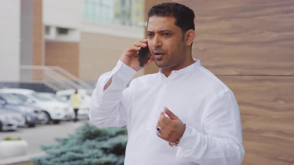 Middle Eastern Man Talking on Smartphone