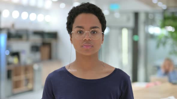 Portrait of Serious Casual African Woman Looking at the Camera