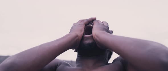 Motivated black man on rooftop