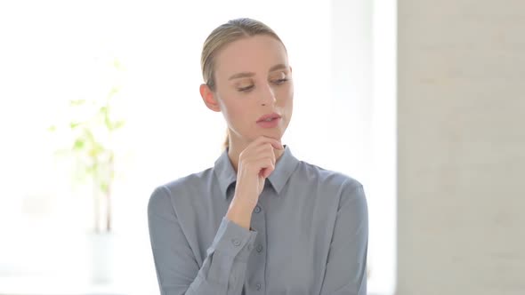 Portrait of Pensive Woman Thinking New Plan