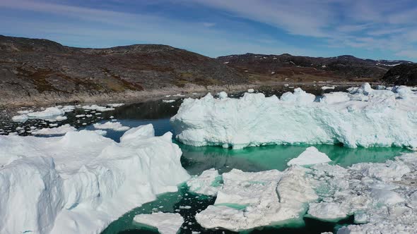 Arctic landscape: mountains, icebergs and glaciers. Climate Change and Global Warming. Ecotourism.