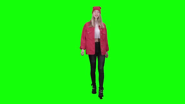 Teenager Is Walking Down the Street. Green Screen. Slow Motion