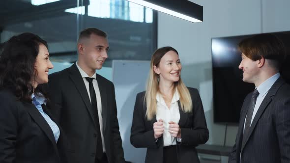 Business Team Celebrating Success Putting Hands Together