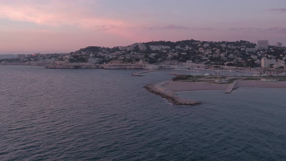 Aerial view of a sea coast at sunset