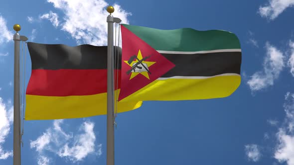 Germany Flag Vs Mozambique On Flagpole