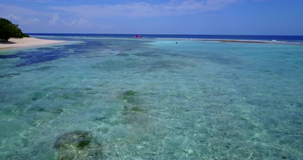 Luxury fly over clean view of a summer white paradise sand beach and blue sea background in colorful