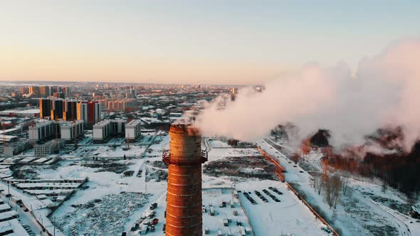 Deep Smoke Coming Out of a Manufacturing Pipe