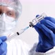 Doctor Fills Injection syringe with Vaccine COVID-19 - VideoHive Item for Sale