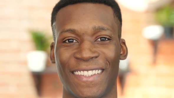 Close Up Of Smiling Black Man Face