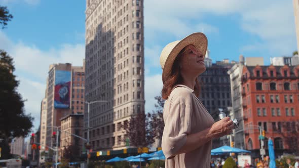 Happy young tourist at the Flatiron in New York