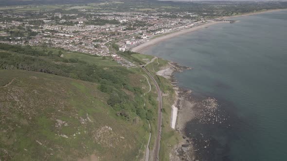 Bird's Eye View Of Bray Head Mountain And Bray Town County In Wicklow, Ireland - aerial drone shot