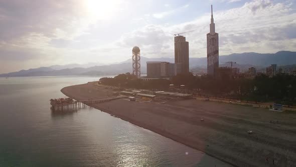 Light Haze Surrounding Batumi Seafront with Buildings at Back, Late Afternoon