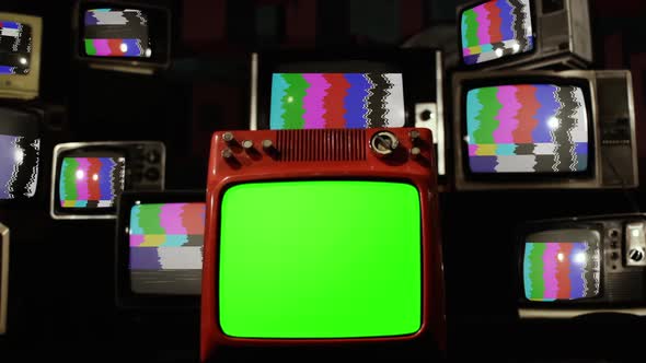 Zoom Out from Green Chroma Key Screen to Stacked Retro TVs with Test Card.