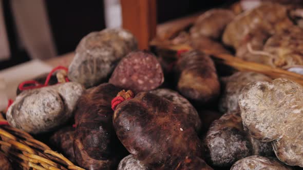 Homemade Uncooked Black Blood Spanish Sausages on Festival Market Traditional Food in Spain