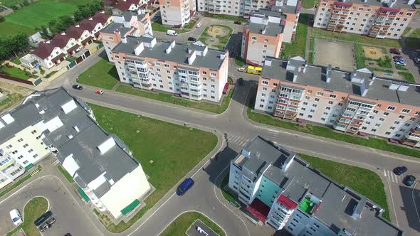 New residental building appartments in modern complex near the green fields in summer.