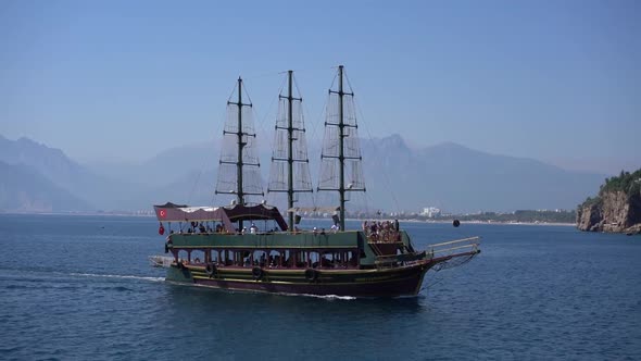 Tourist Pirate Yacht Approaches the Shore