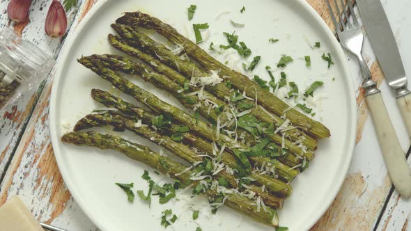 Roasted Asparagus with Parmesan Cheese and Parsley. Healthy Spring Food Concept. View From Above.