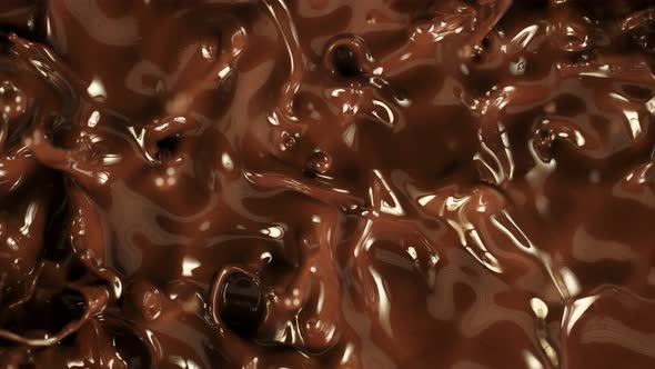 Super Slow Motion Detail Shot of Splashing Melted Chocolate at 1000 Fps