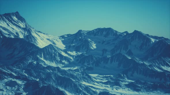 Aerial View of the Alps Mountains in Snow